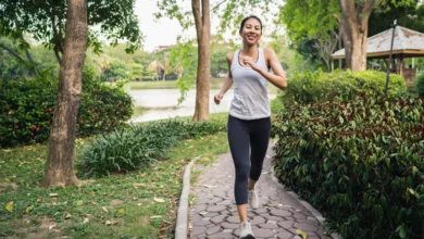 Woman performing Japanese Walking Exercise during a brisk interval walk in a park