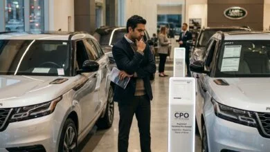 Buyer comparing certified pre-owned and regular used SUVs inside a Canadian dealership.
