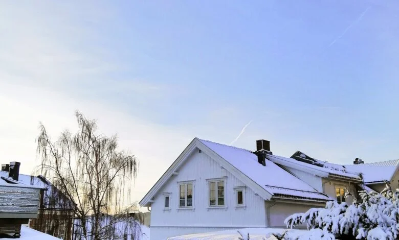Snow-covered BC home during a winter storm