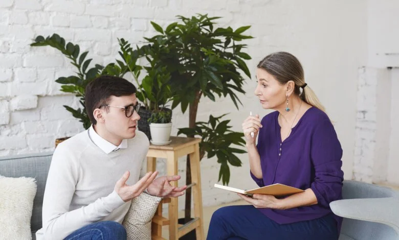 Mental health counselling session with a client and therapist
